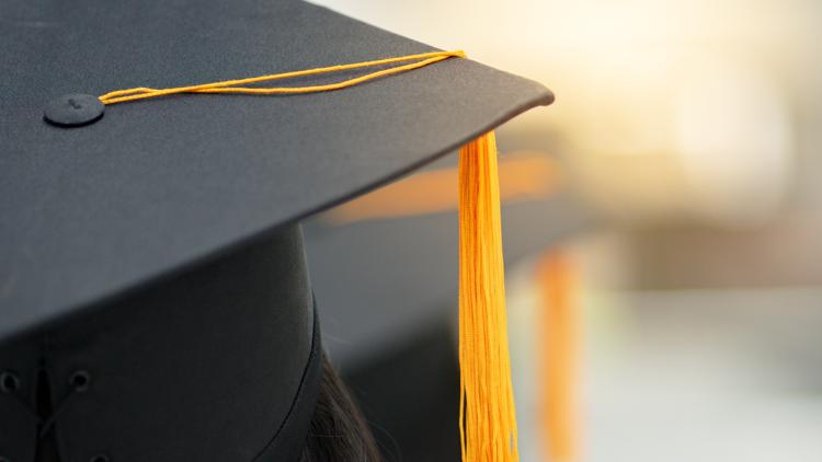 Indy graduation company investing $8 million into new distribution facility, printing technology, upgrades to headquarters
